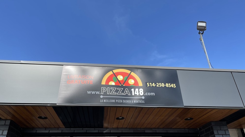 Montreal's New Pizza Place KosherGuru Bringing Anything and